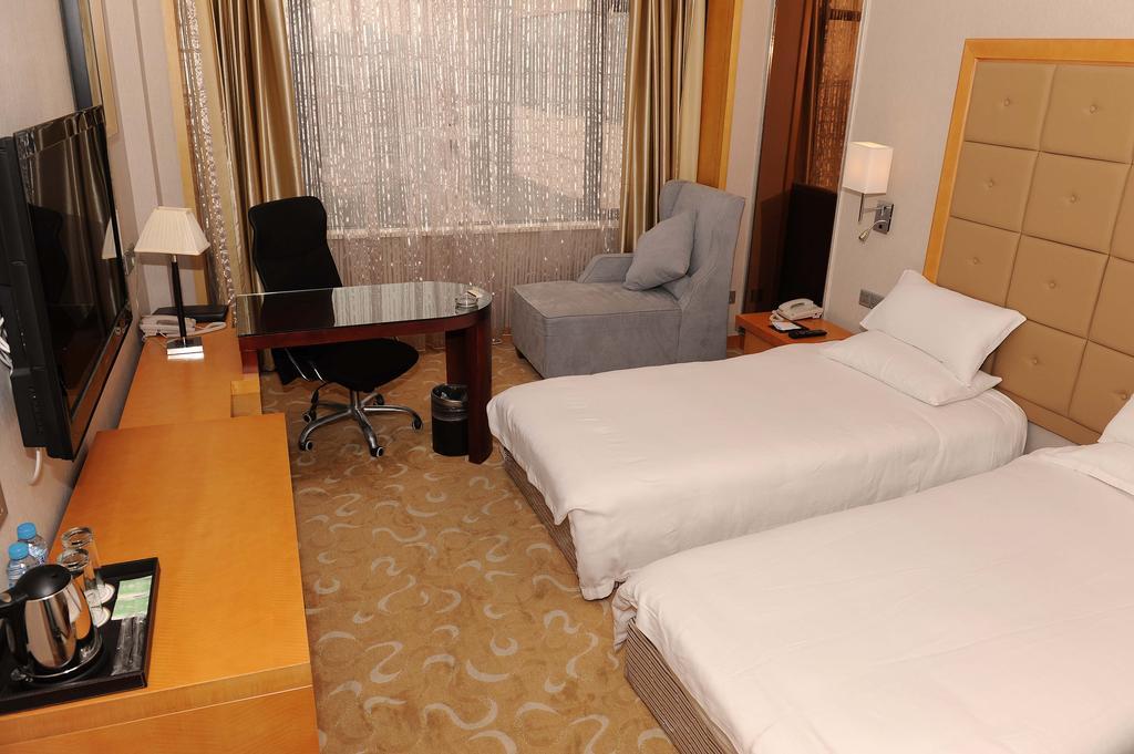 Shanghai Sky Rainbow Hotel Oda fotoğraf